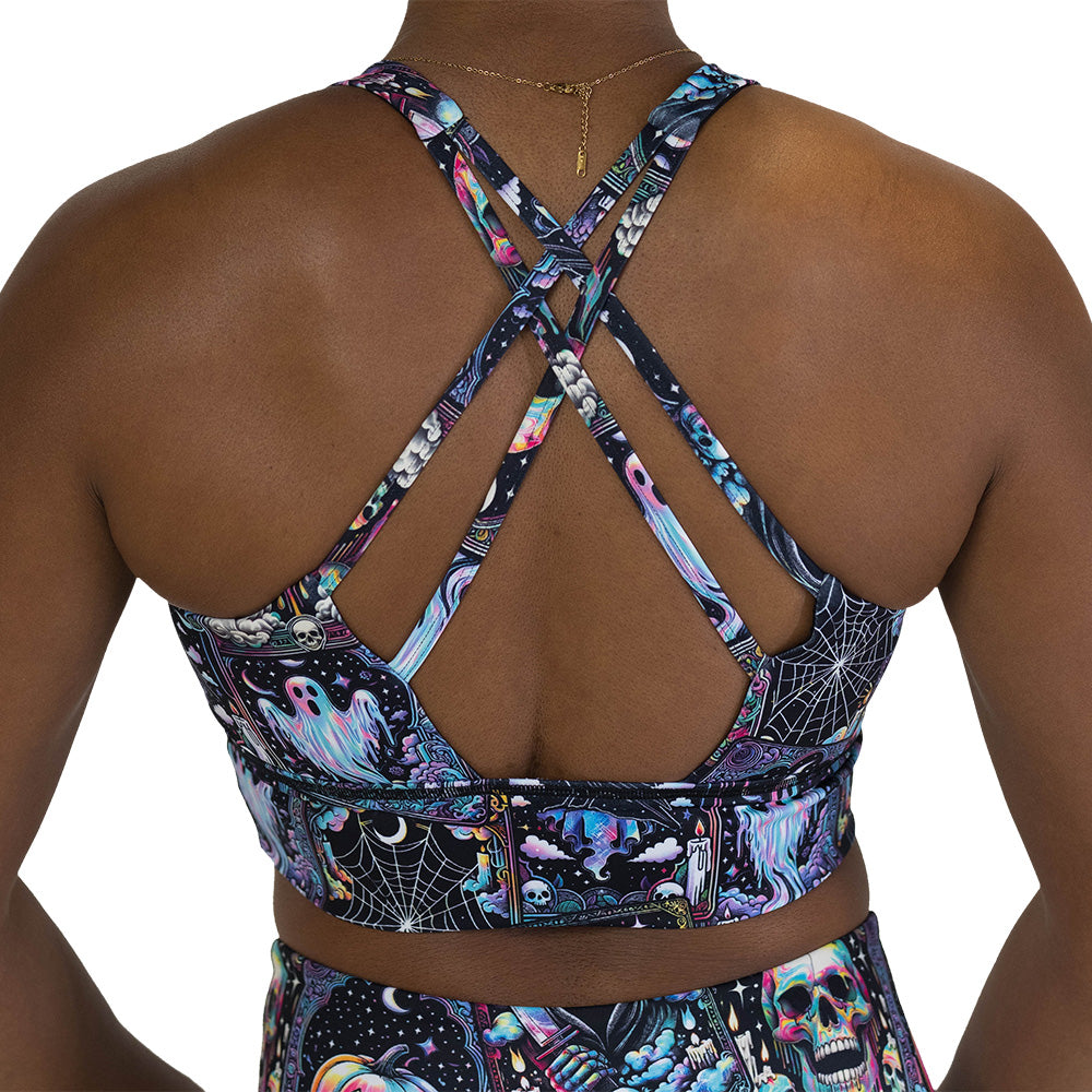 back of the colorful Halloween-themed sports bra