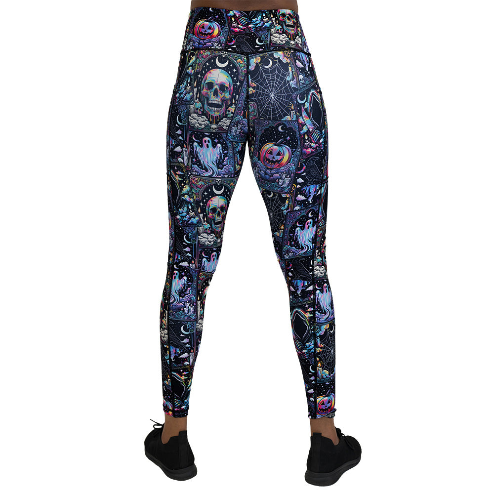 back of the Colorful Halloween-themed leggings with skulls, ghosts, and pumpkins