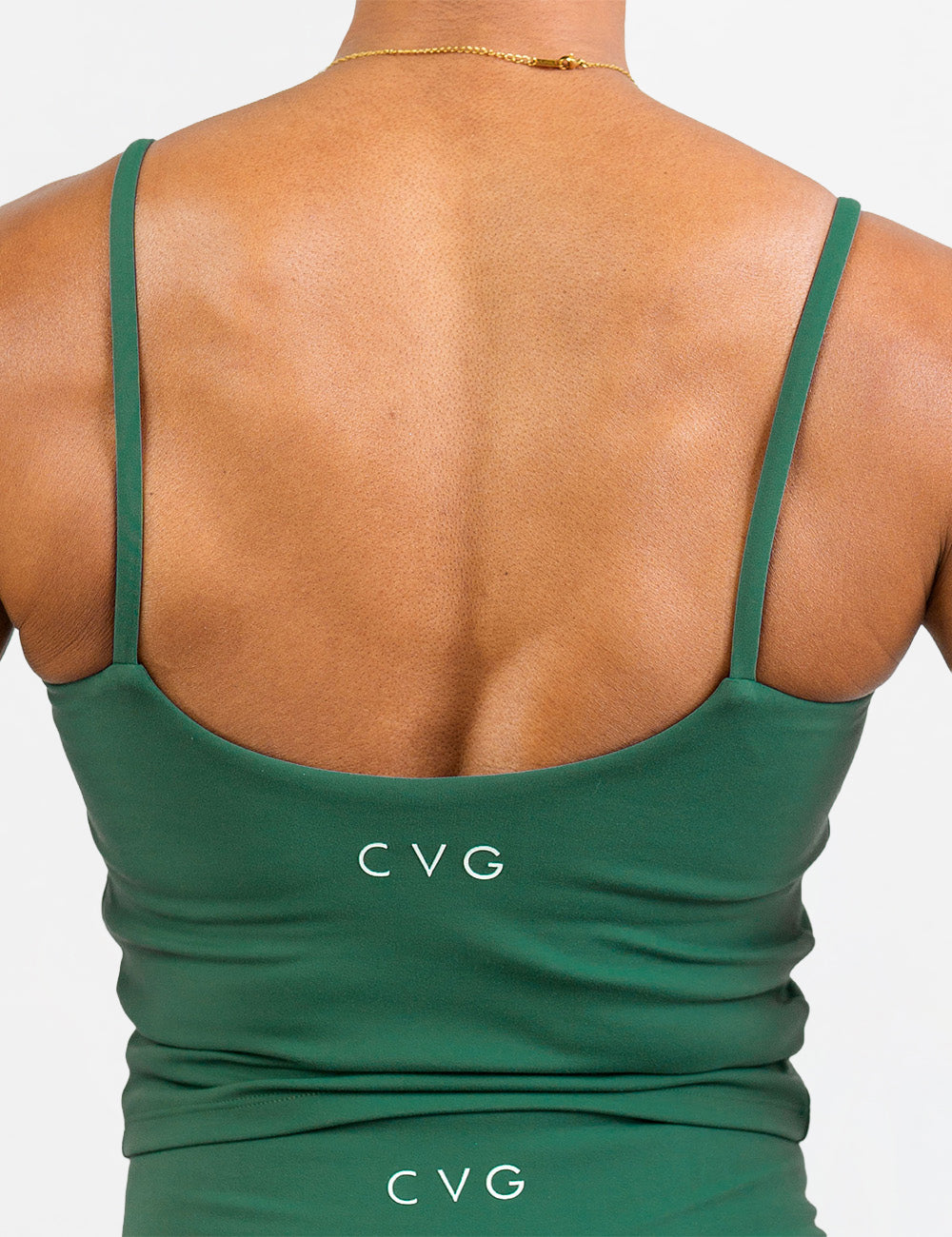back of the green cami top against a white background