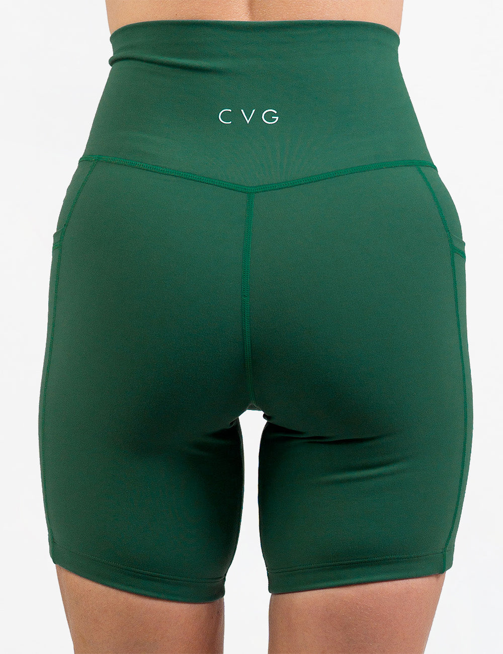 back of the 7 inch solid dark green shorts against a white background