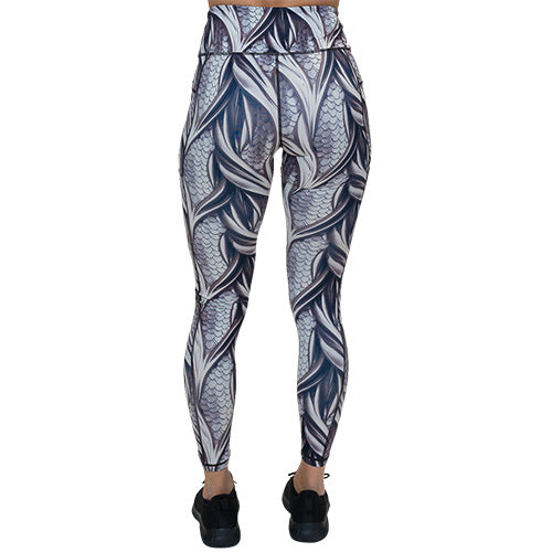 back of full length grey dragon scale print leggings