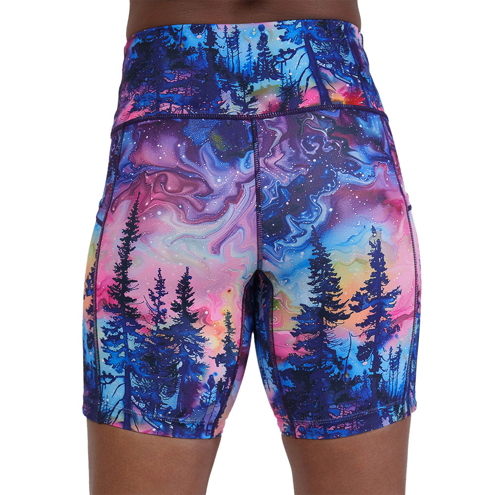 back of the watercolor rainbow patterned forest 7 inch shorts against a white background