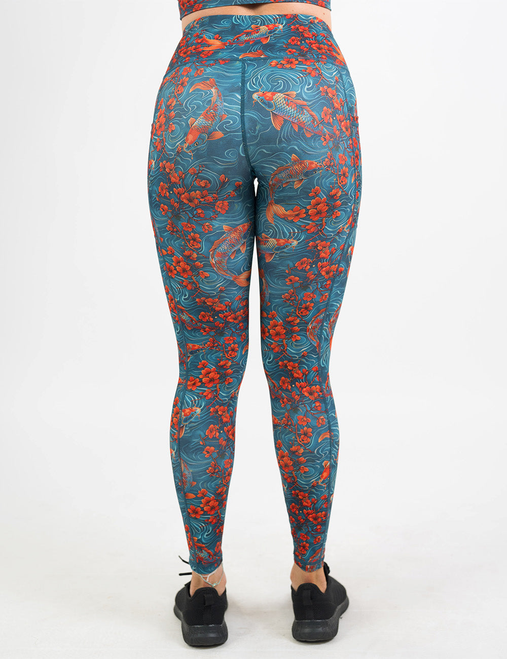 back of the koi fish swimming with orange flowers full length leggings