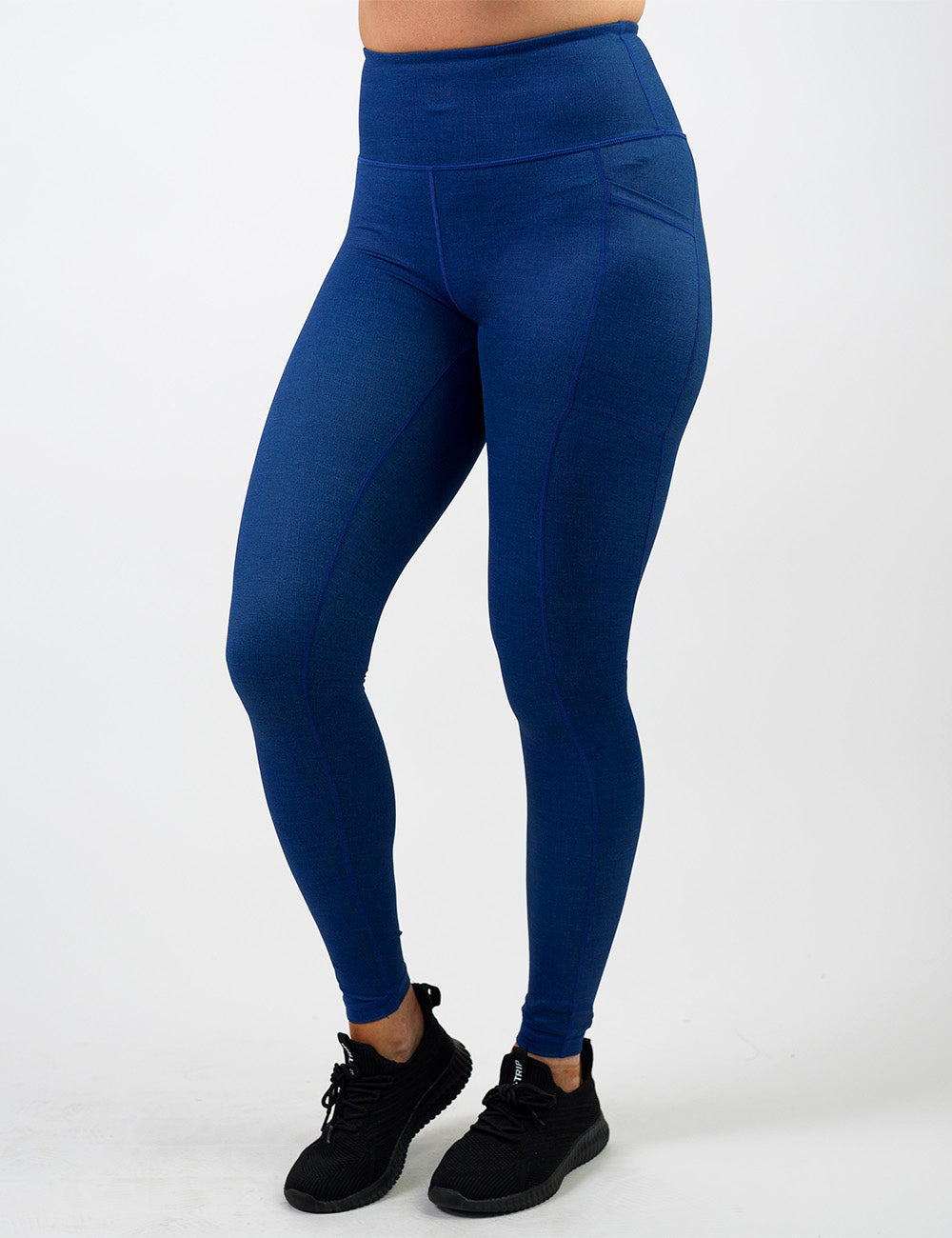 front of the blue denim inspired pattern full length leggings against a white background
