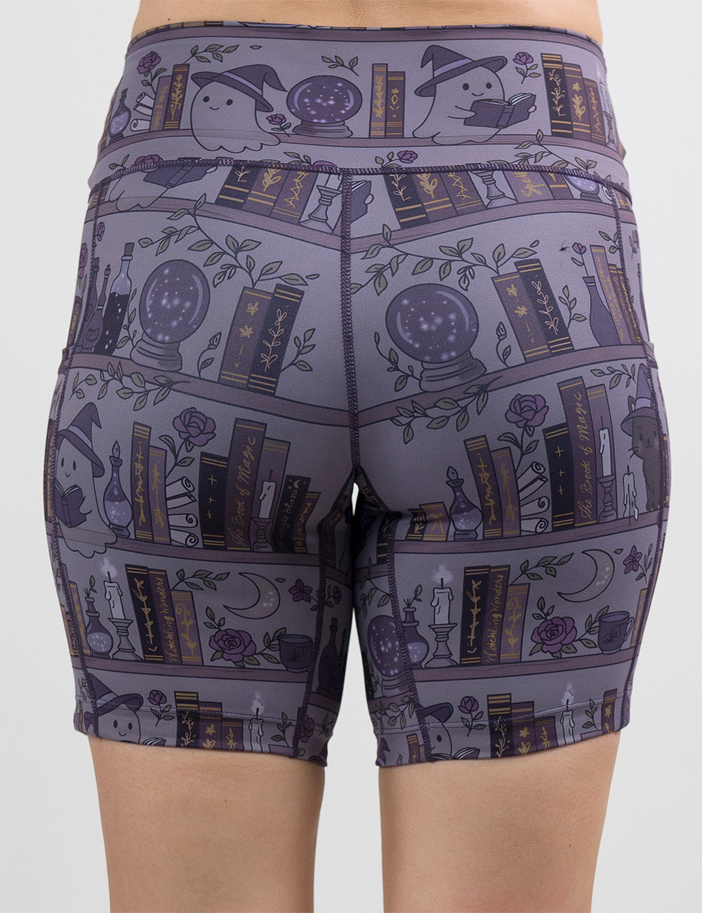 back of the ghosts and cats book shelves 7 inch shorts against a white background