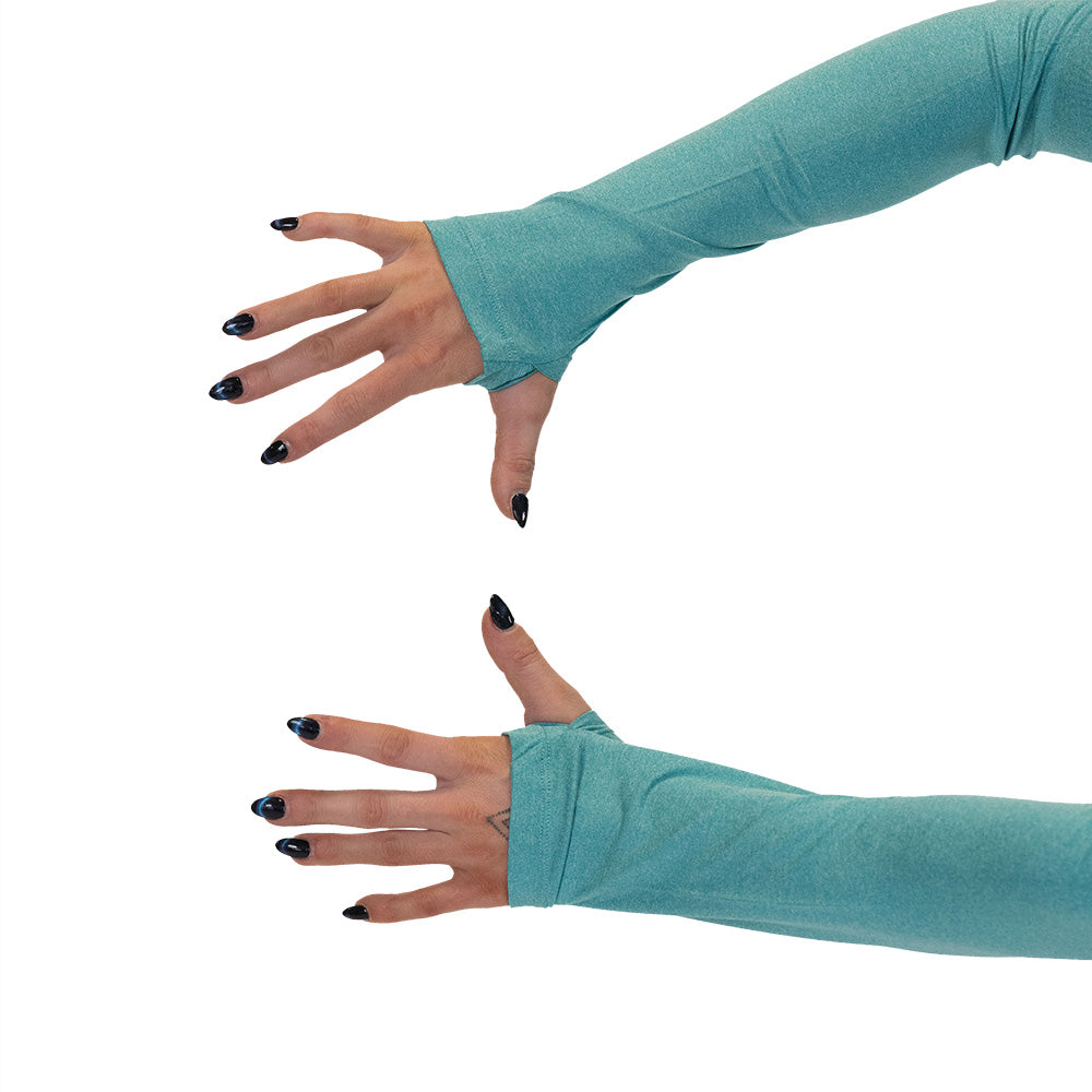 close up of the thumbholes on the Turquoise long sleeve crop top