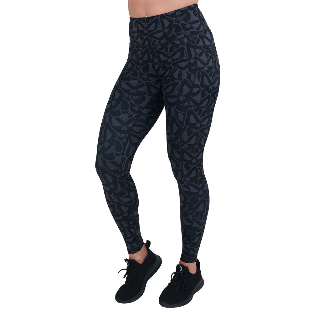 grey and black butterfly shaped skulls patterned leggings