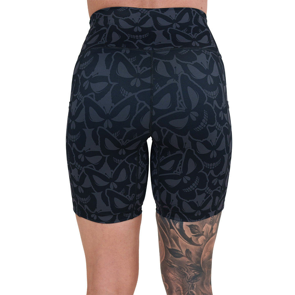 back of the 7 inch grey and black butterfly shaped skulls patterned shorts