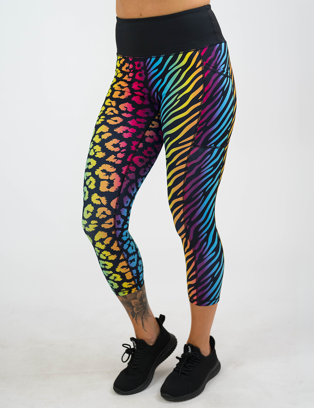 front of the capri rainbow leopard and zebra print leggings against a white background