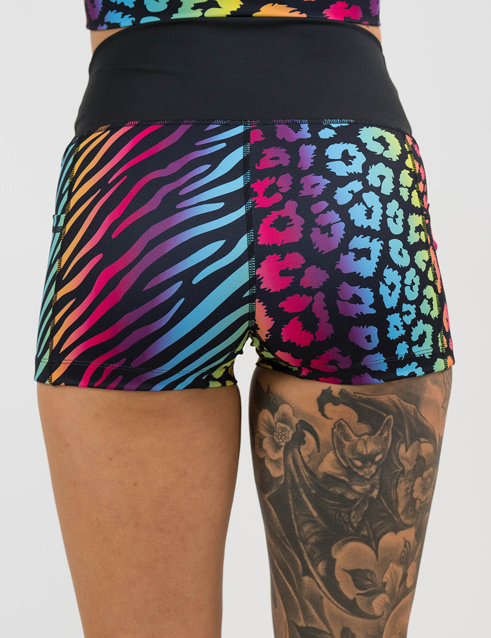 back of the 2.5 inch zebra and leopard rainbow print shorts against a white background