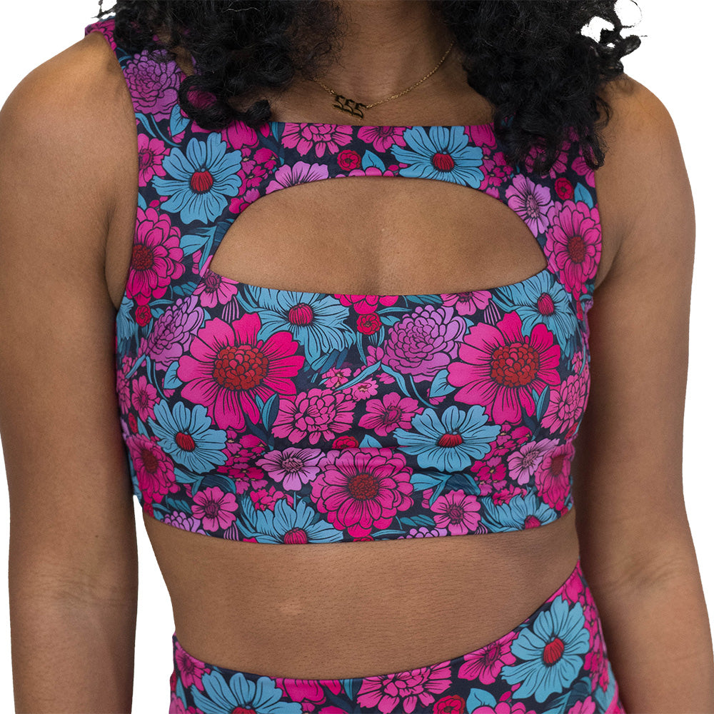 pink and blue floral patterned sports bra