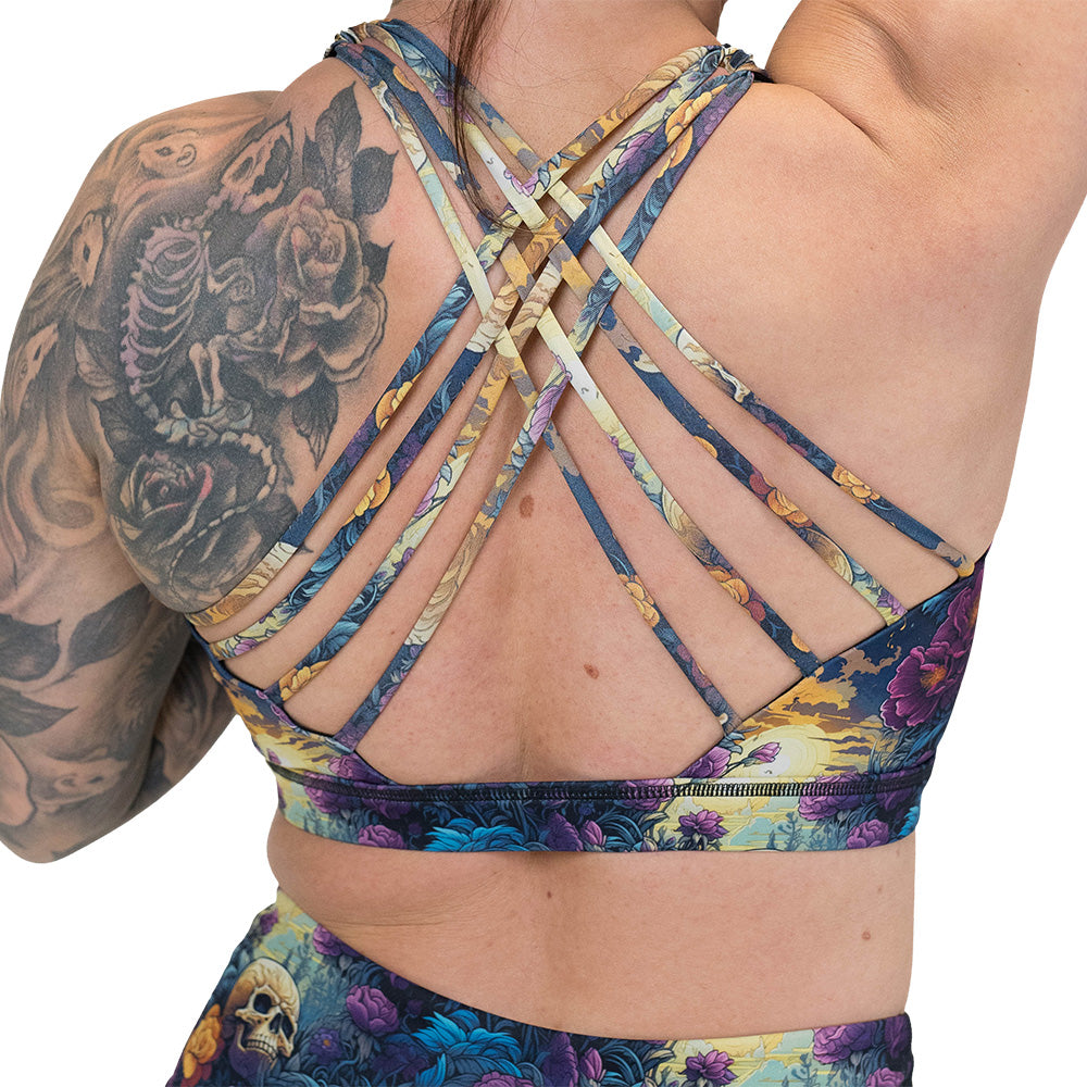 back of the skulls and flowers patterned sports bra