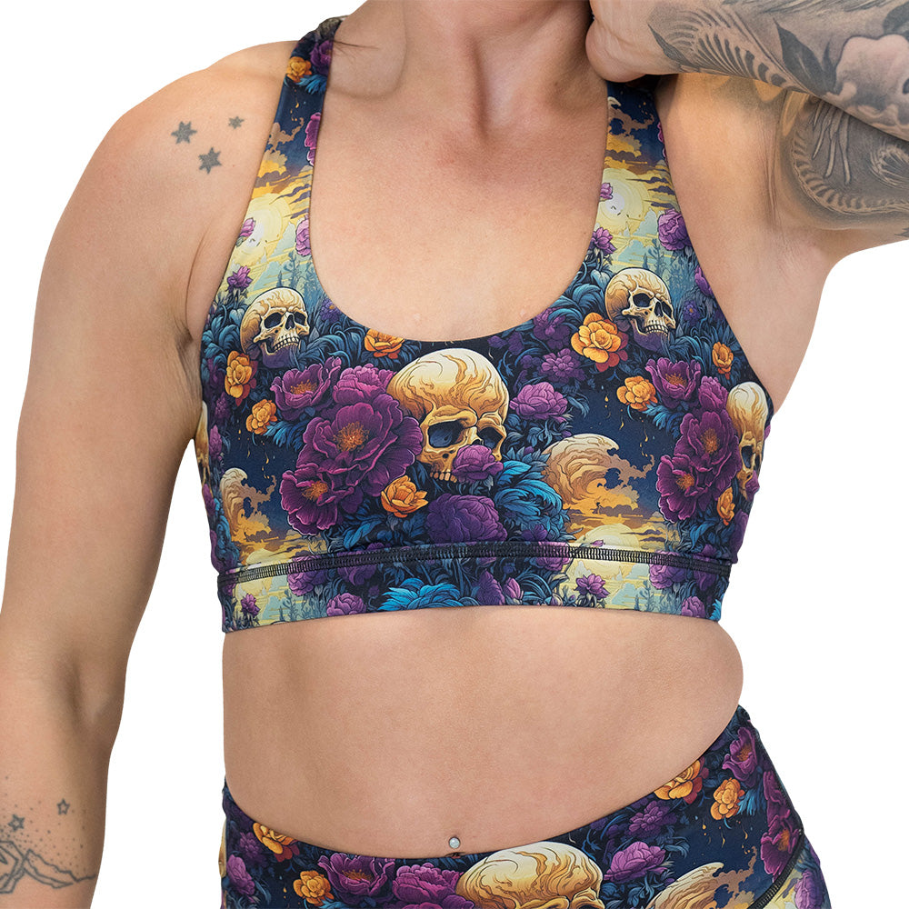skulls and flowers patterned sports bra