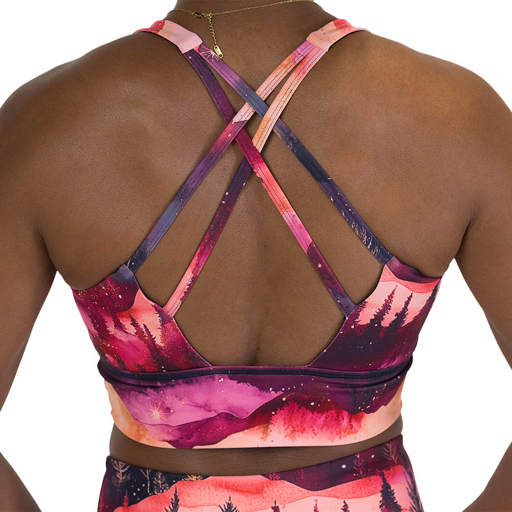 back of the bra with forest design and red ombre sky