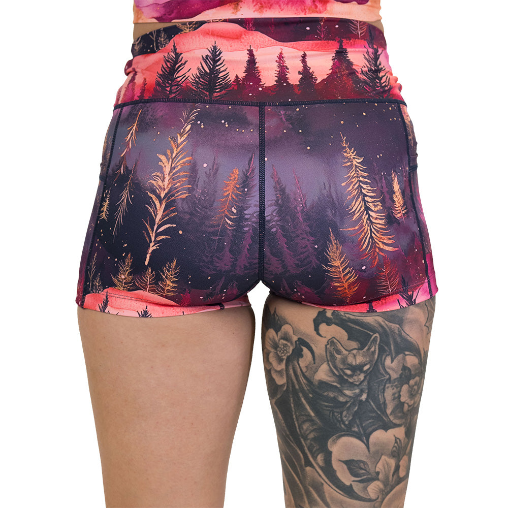 back of the shorts with forest design and red ombre sky