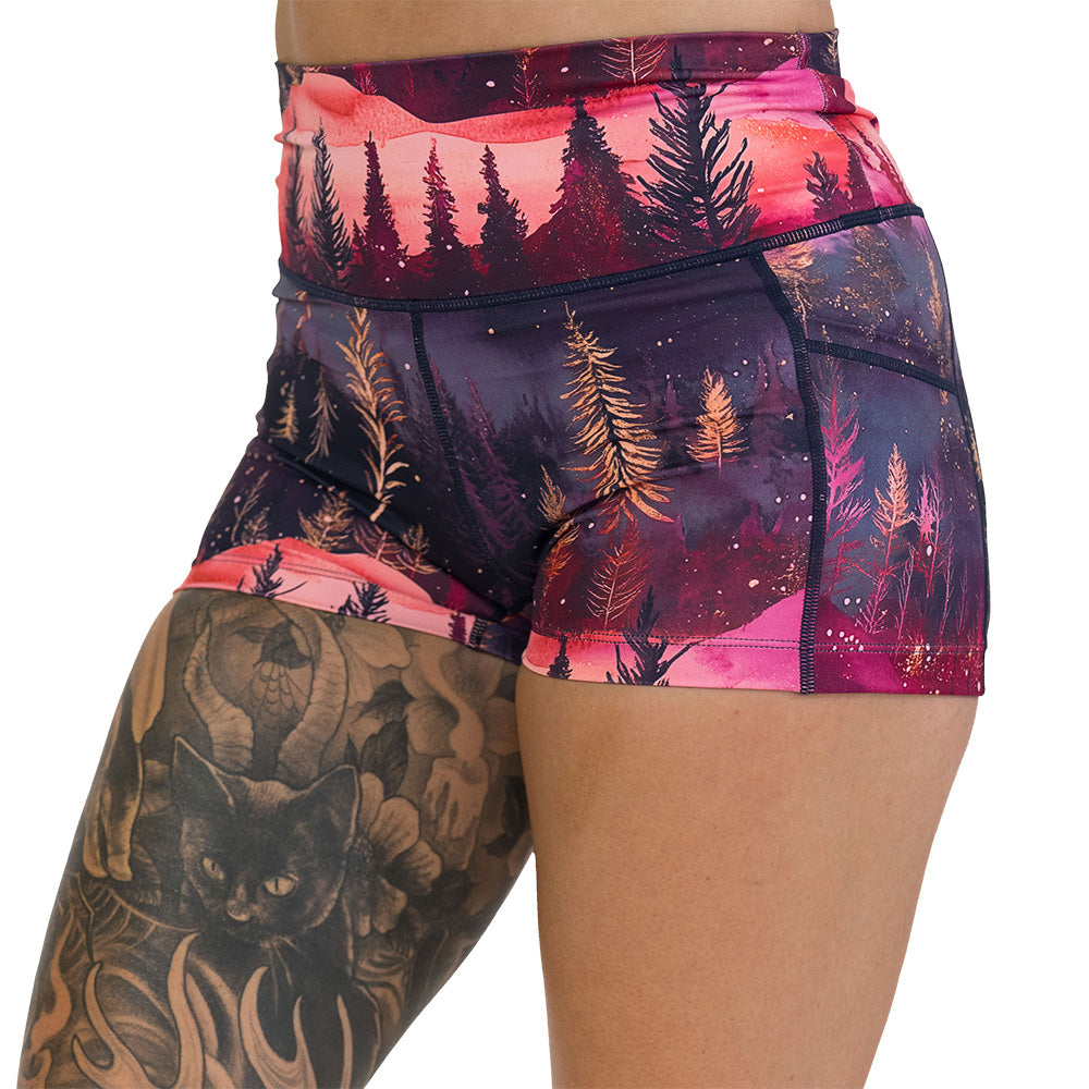 shorts with forest design and red ombre sky