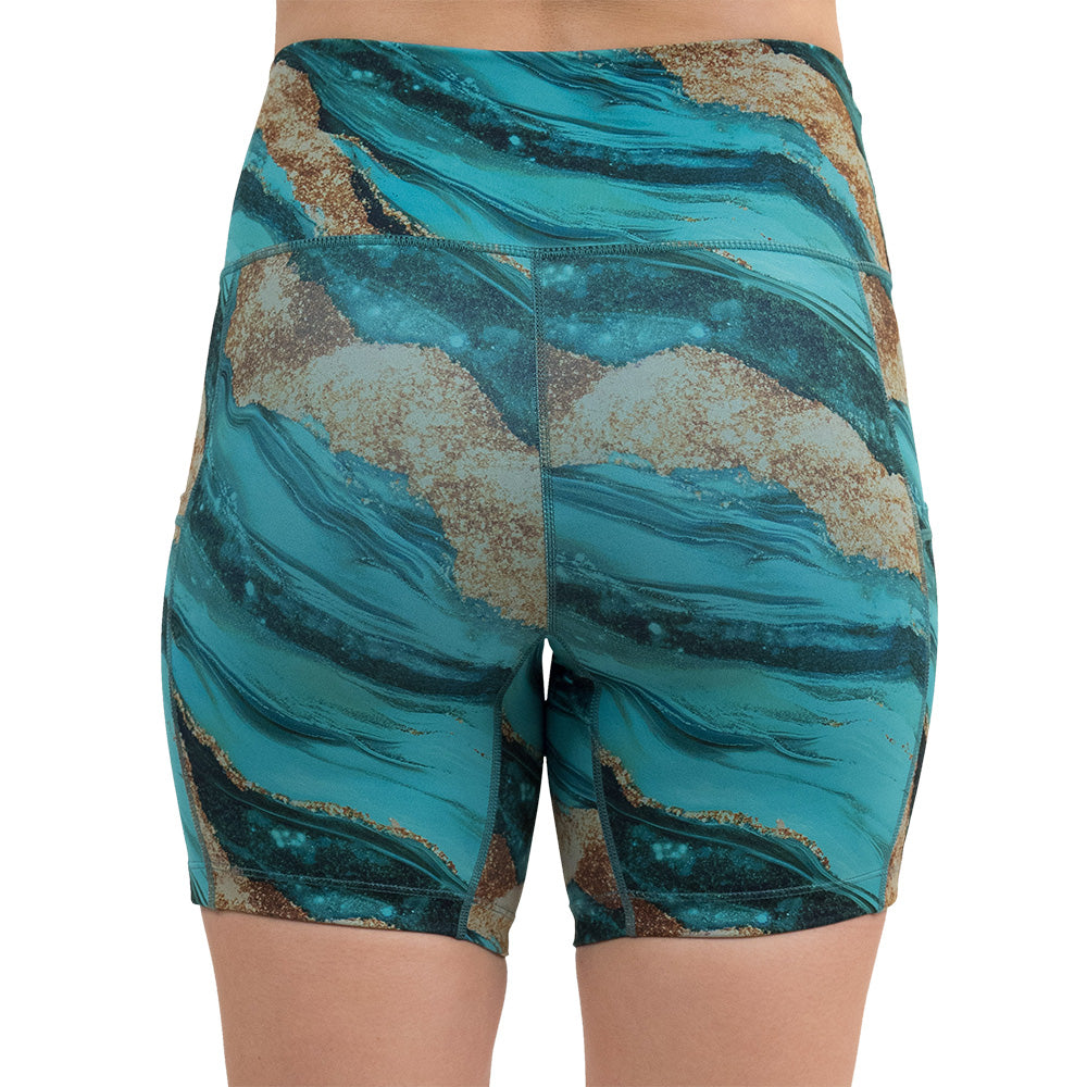 back of the blue ocean with gold streaks patterned 5 inch shorts against a white background
