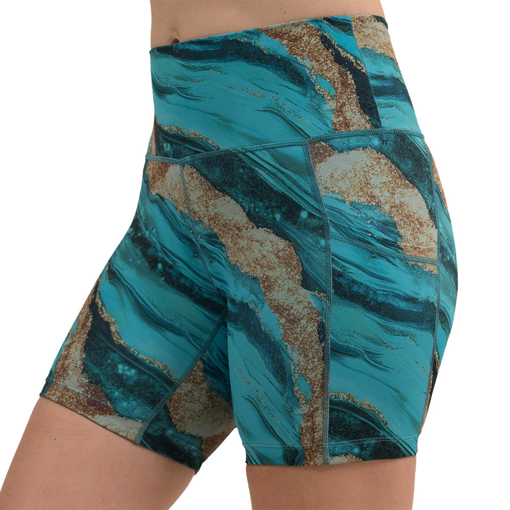 blue ocean with gold streaks patterned 5 inch shorts facing the front against a white background