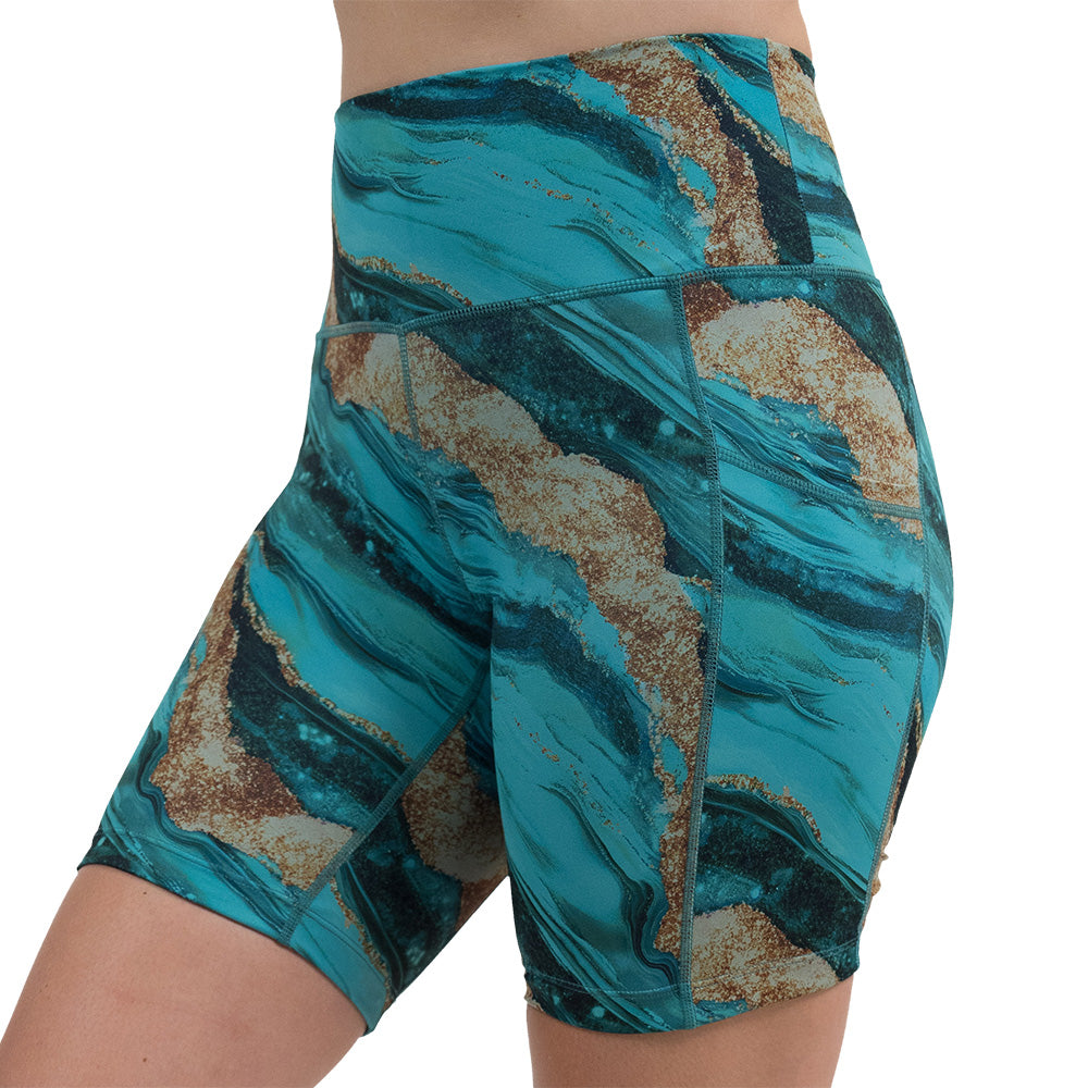 blue ocean with gold streaks patterned 7 inch shorts facing the front against a white background