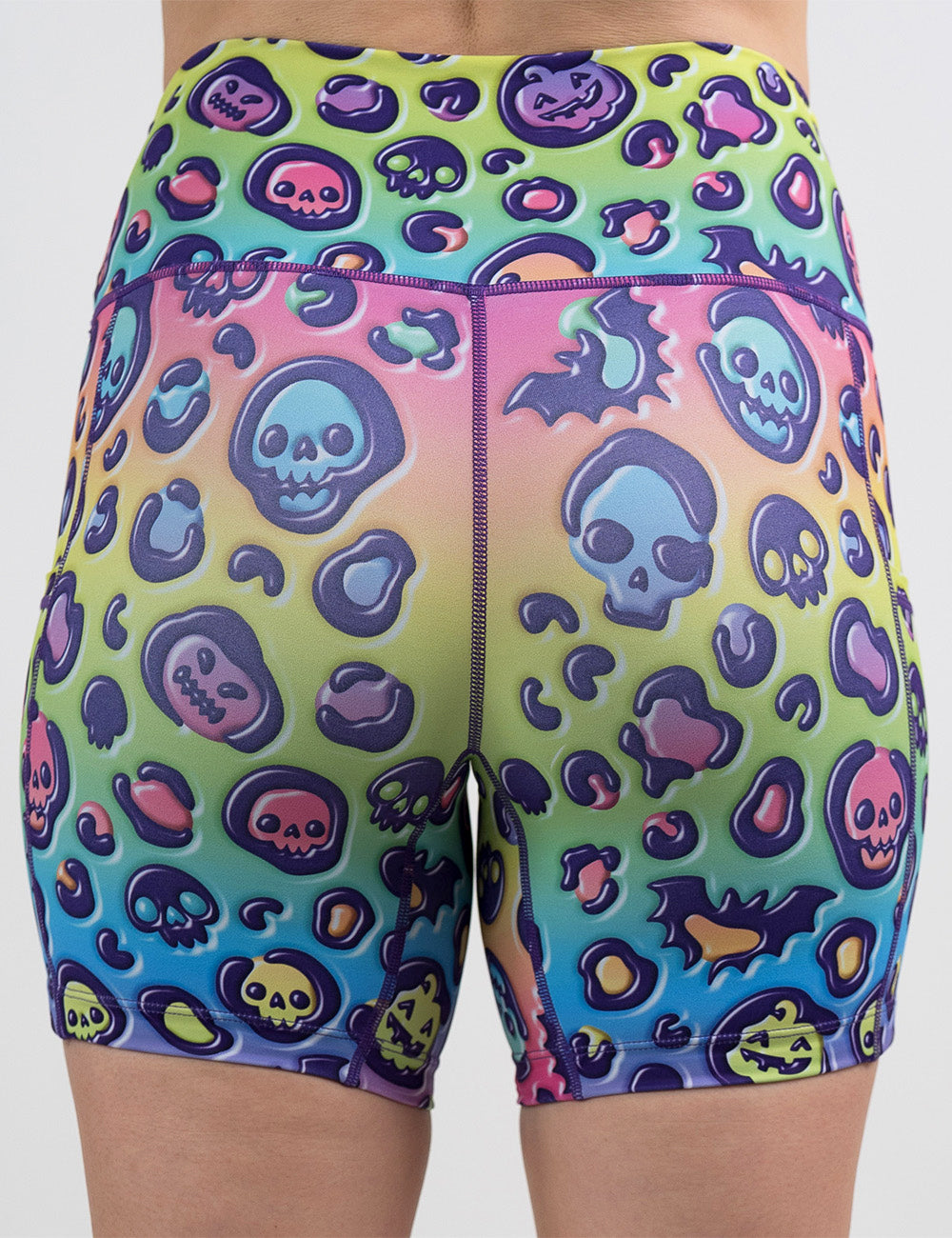 back of the rainbow leopard print pumpkins and skulls 7 inch shorts against a white background