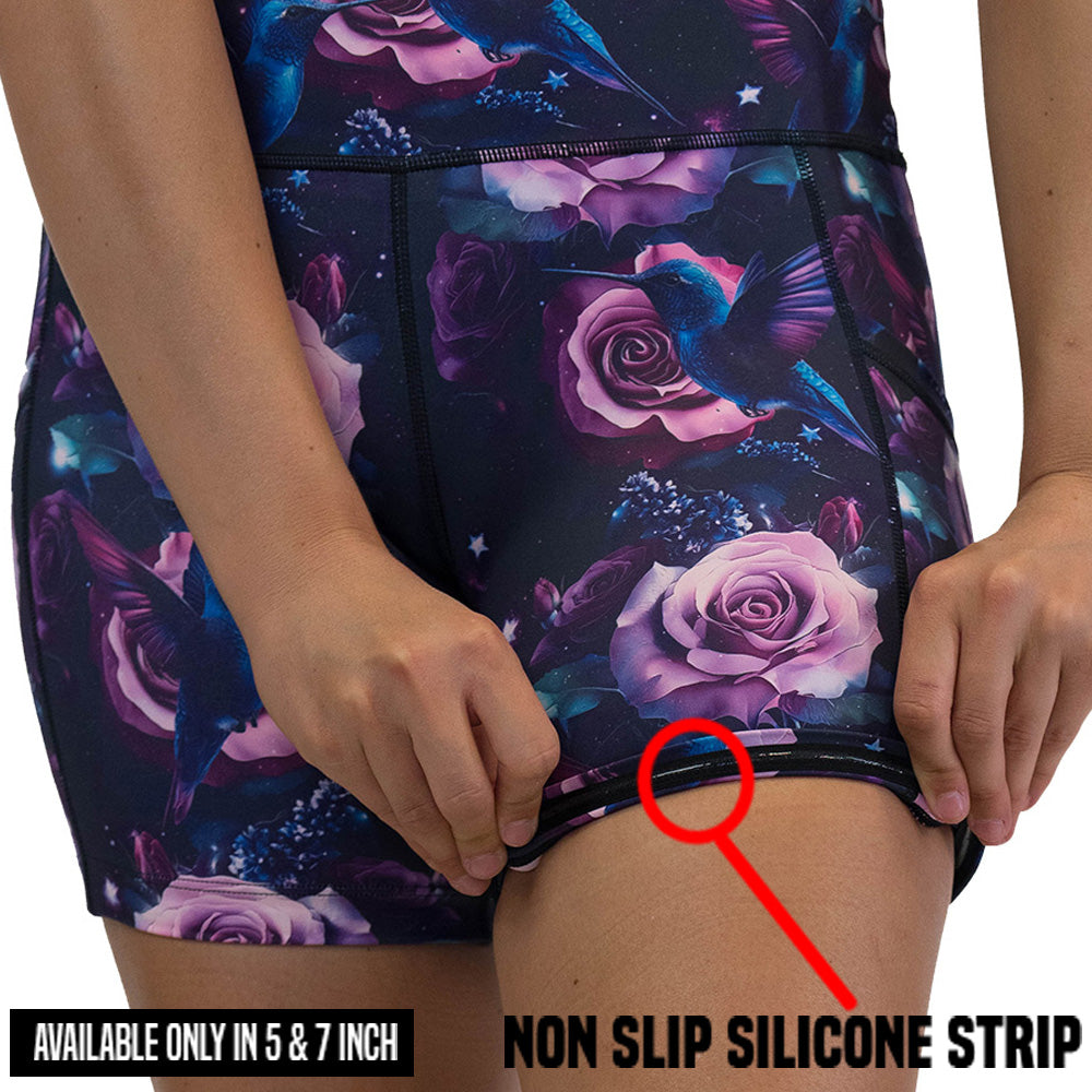 non slip strip on the shorts with a design of a blue hummingbird and pink roses