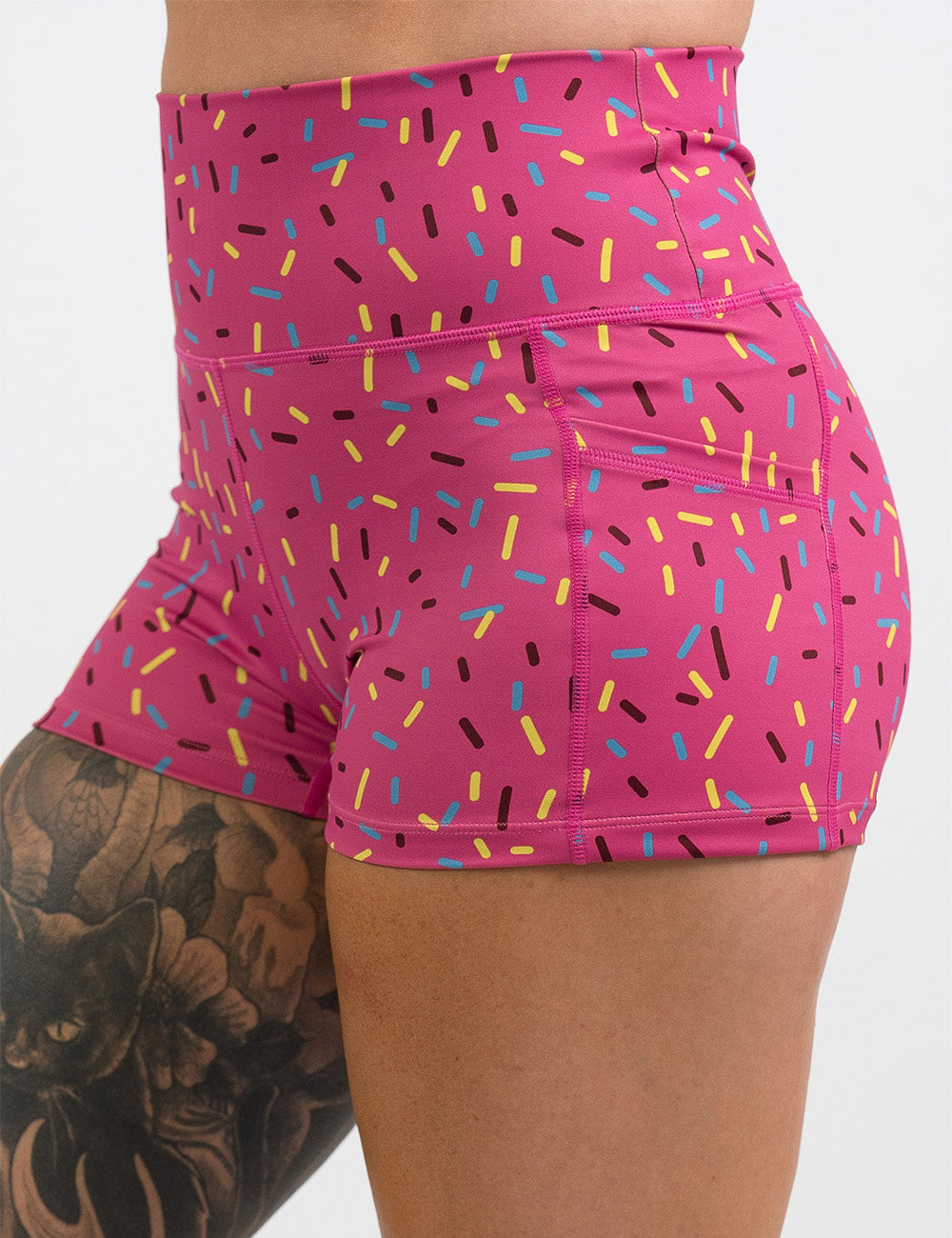 front of the 2.5 inch pink shorts with a sprinkles pattern against a white background