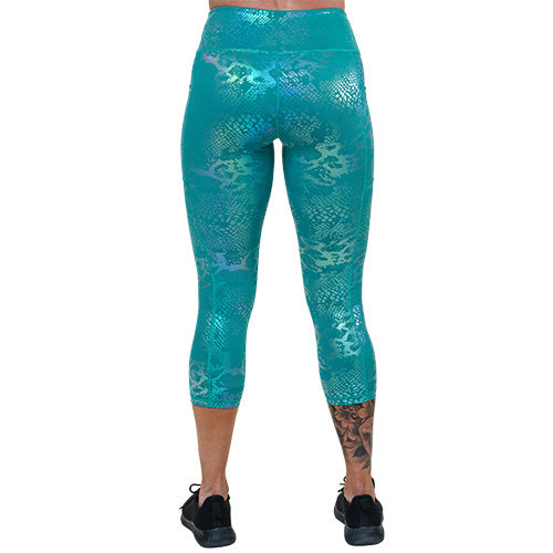 back of capri length blue iridescent leggings