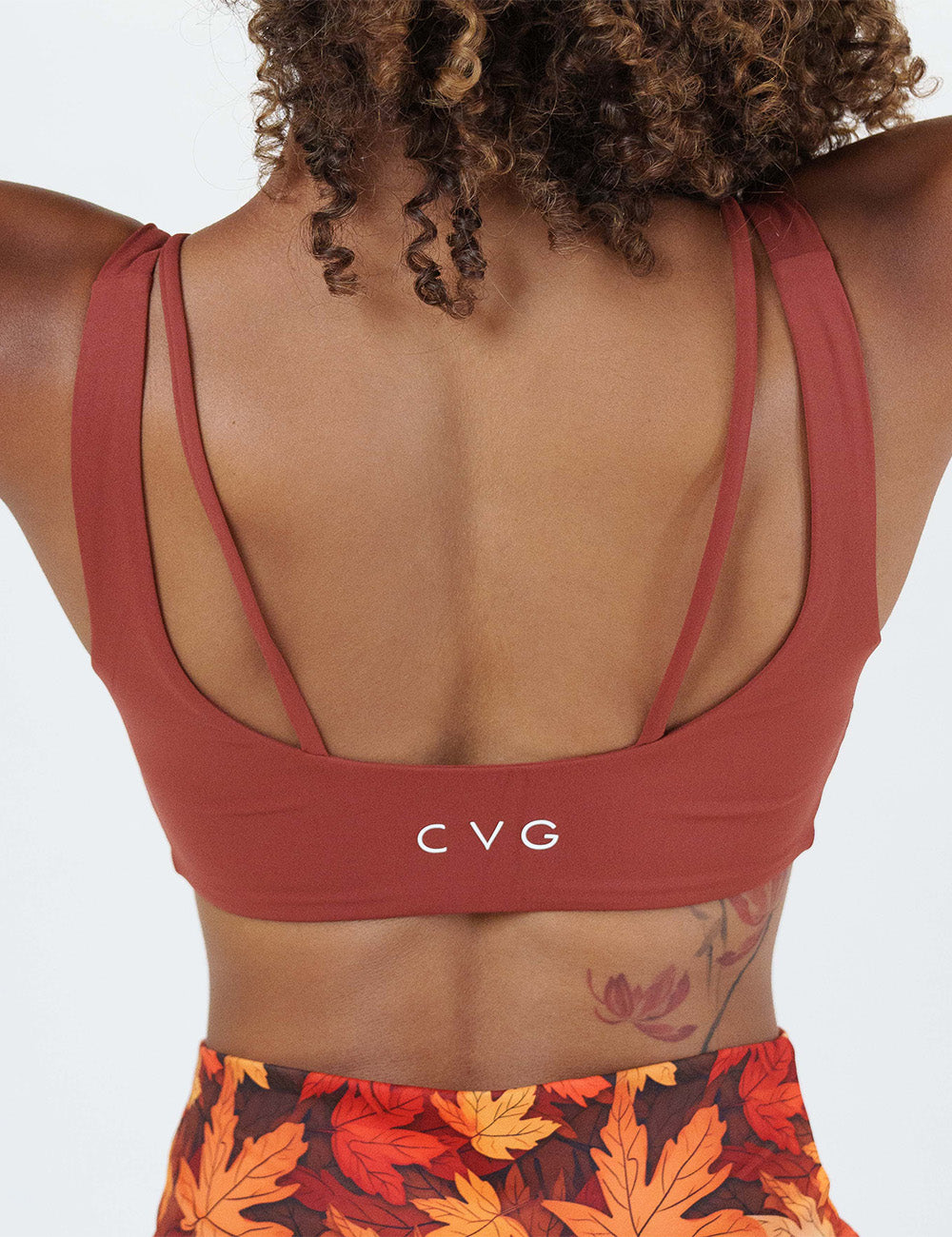 back of the solid auburn red bra against a white background
