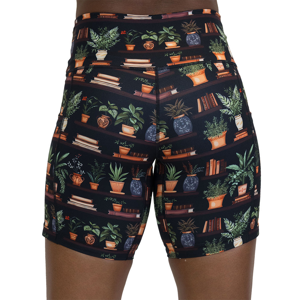 back of the floral patterned shorts with books design on it