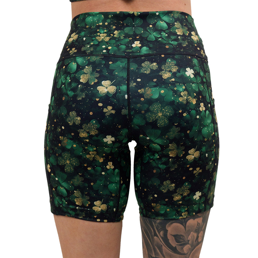 back of the green and gold shamrock patterned 7 inch shorts against a white background