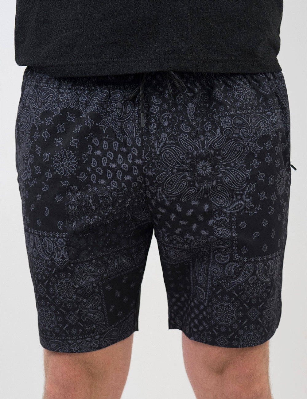 front of the black men's shorts with a grey paisley pattern against a white background