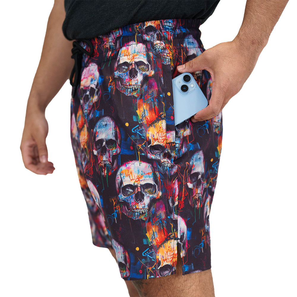 pocket on the paint splatter and skull print men's shorts