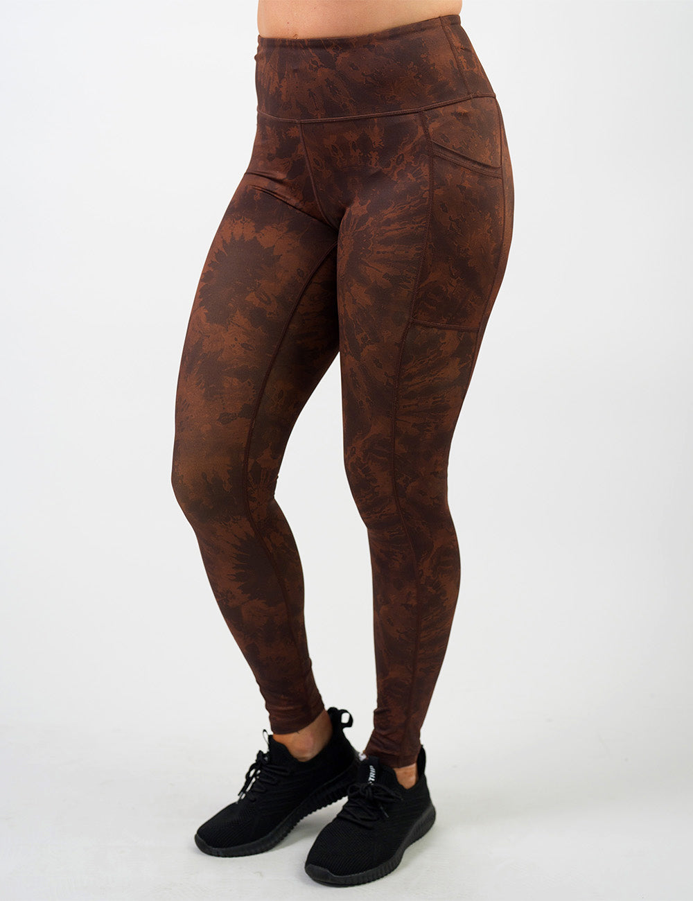 front of the brown tie dye full length leggings against a white background