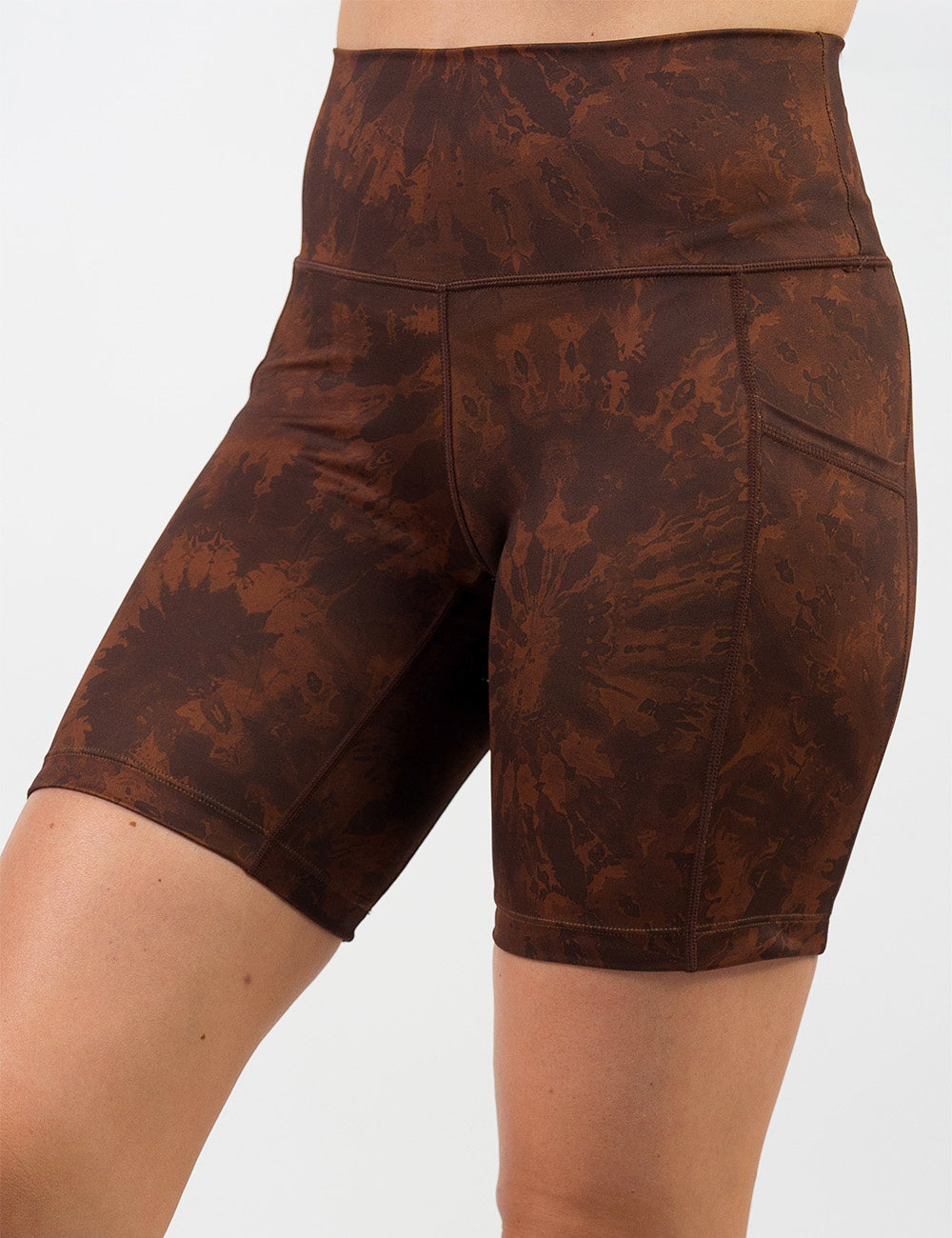 front of the 7 inch brown tie dye shorts against a white background