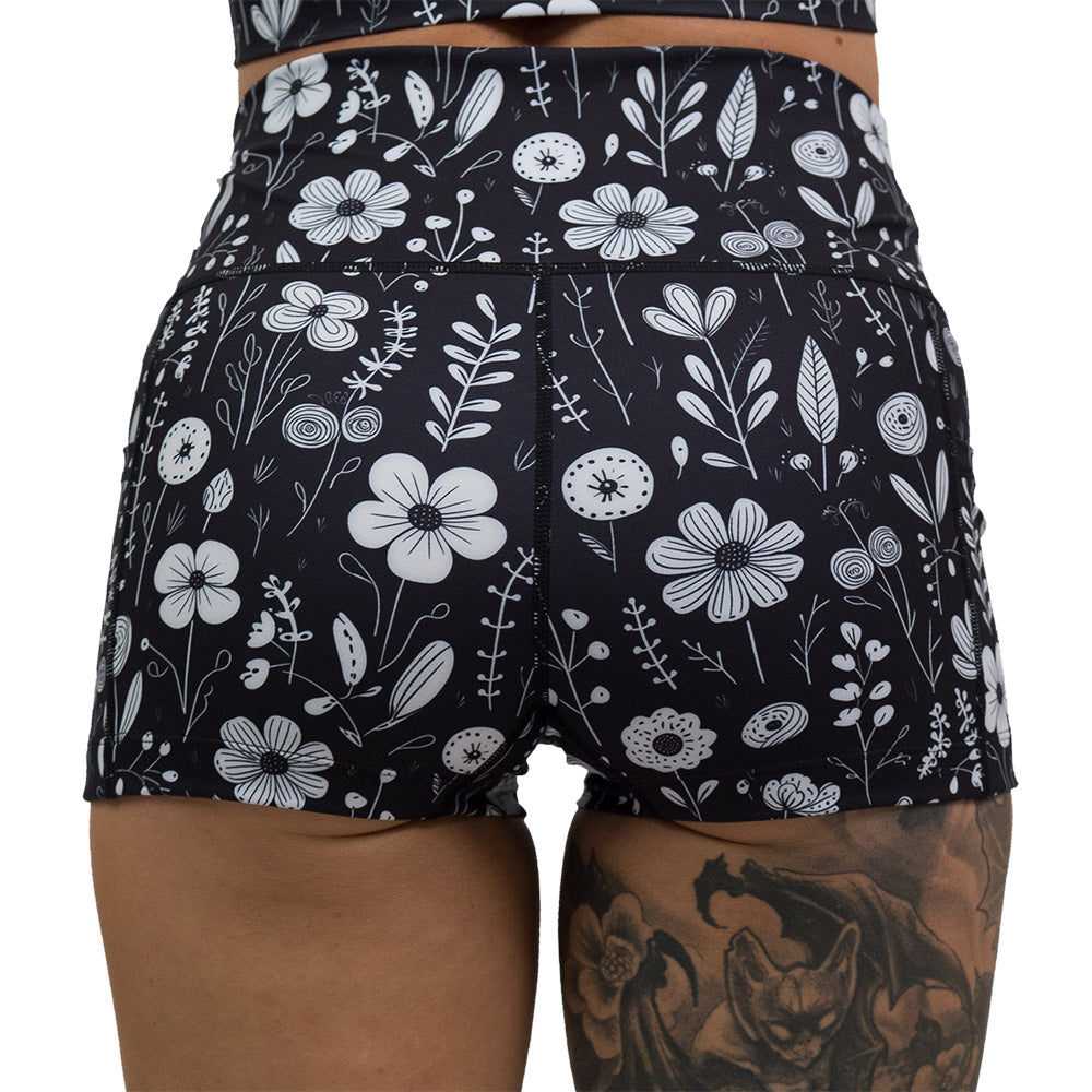 back of 2.5 inch black and white floral shorts