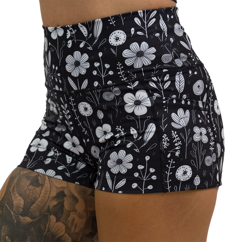 close up of 2.5 inch black and white floral shorts
