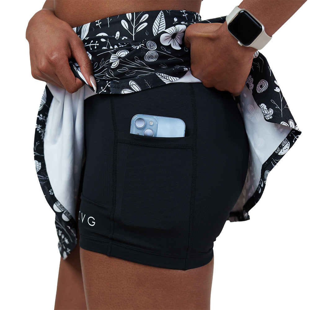 shorts underneath the black and white floral skirt