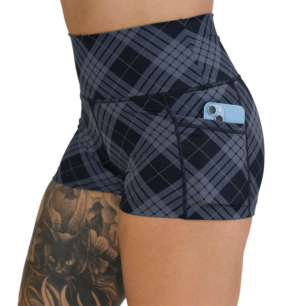 pocket on the plaid patterned shorts