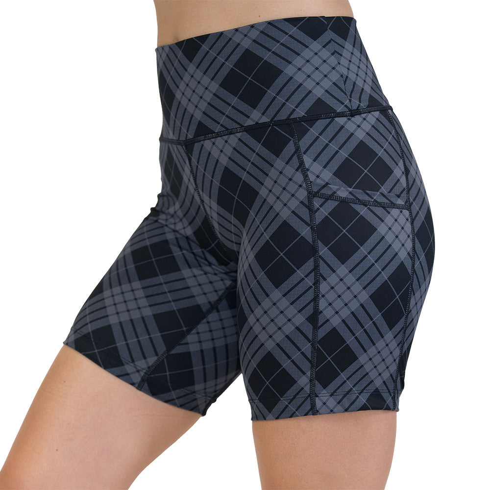 Plaid patterned shorts on a white background