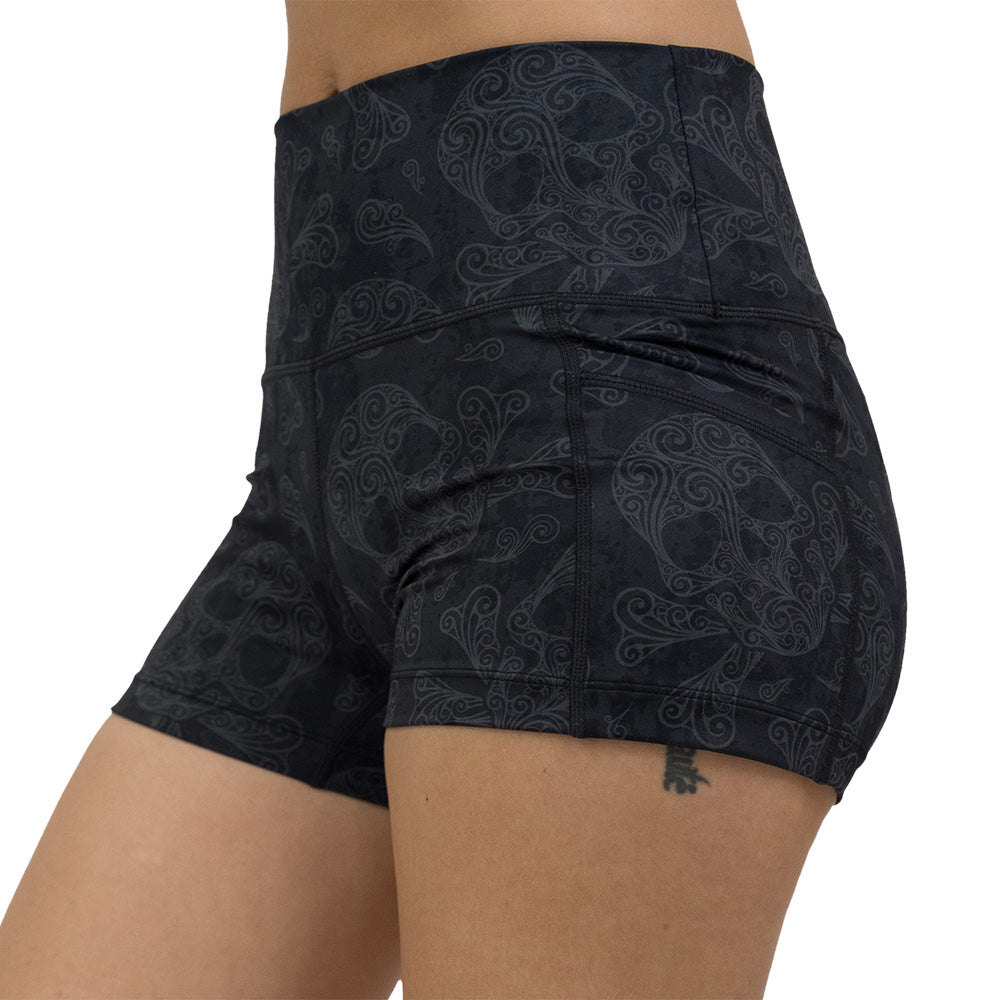 2.5 inch dark pirate themed skull and cross bones print shorts facing the front