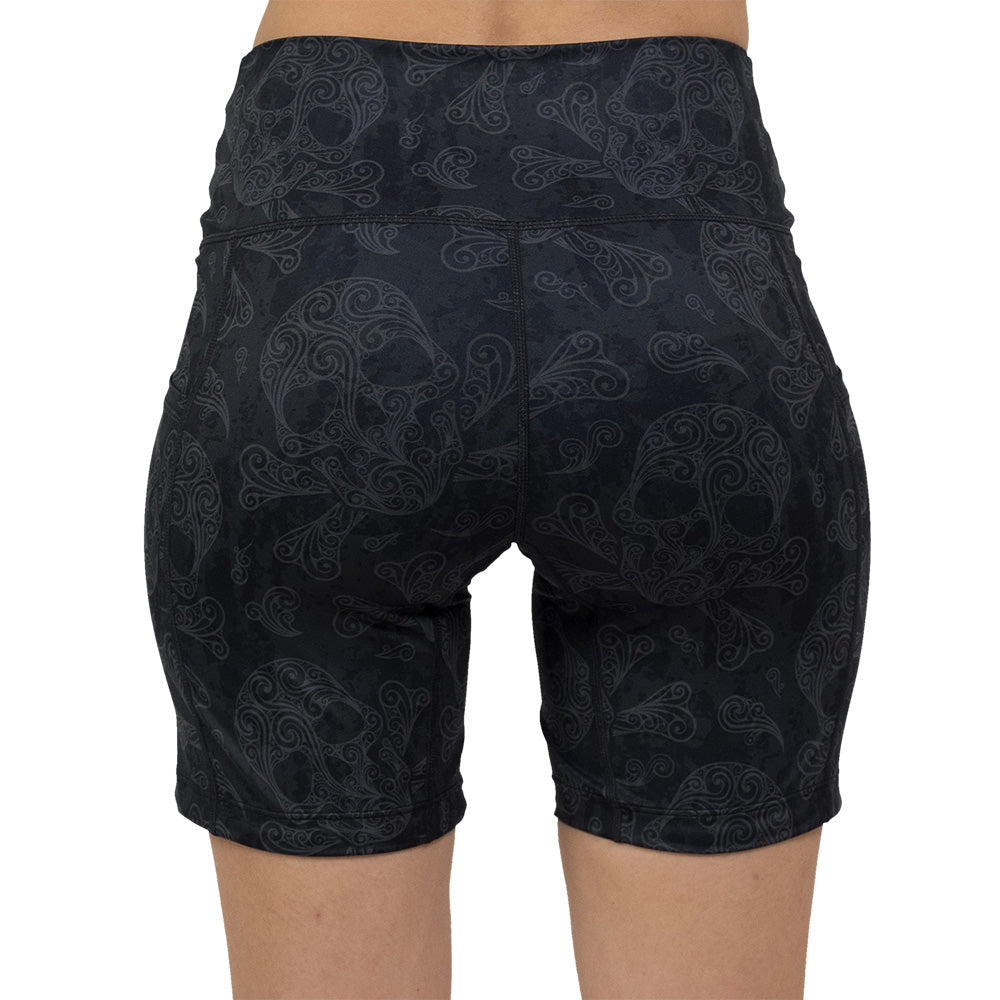 back of 7 inch dark pirate themed skull and cross bones print shorts