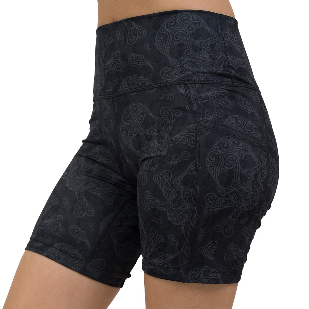 7 inch dark pirate themed skull and cross bones print shorts facing the front