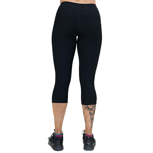 back of capri length black ribbed leggings