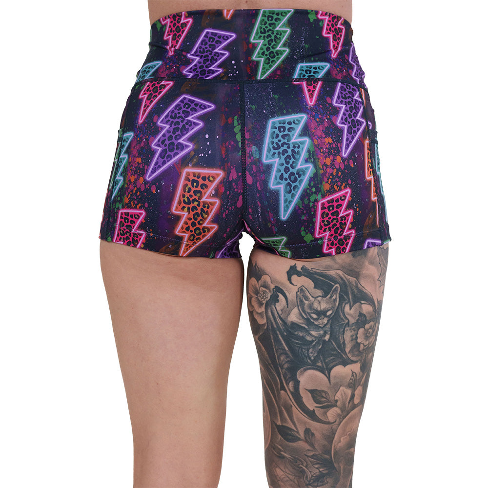 back of the neon thunderbolts patterned shorts