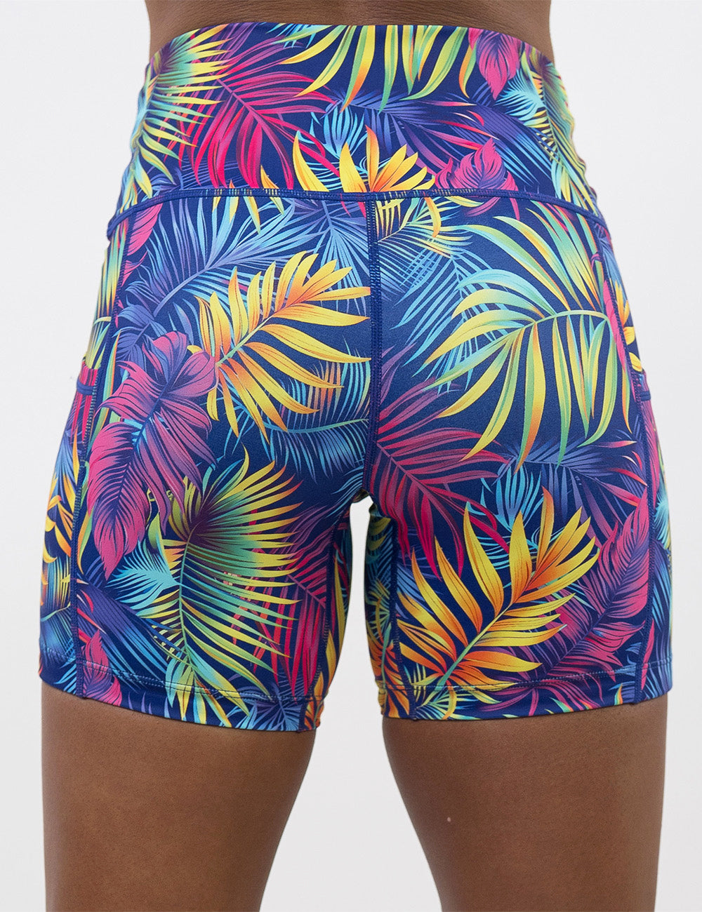 back of the 5 inch vibrant tropical leaves shorts against a white background