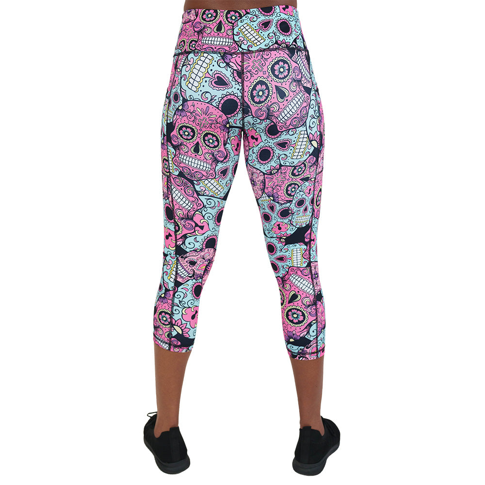 back of the pink, blue & purple skull print leggings
