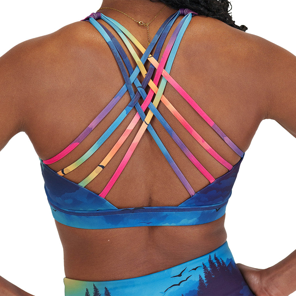 back of the colorful sunset patterned sports bra