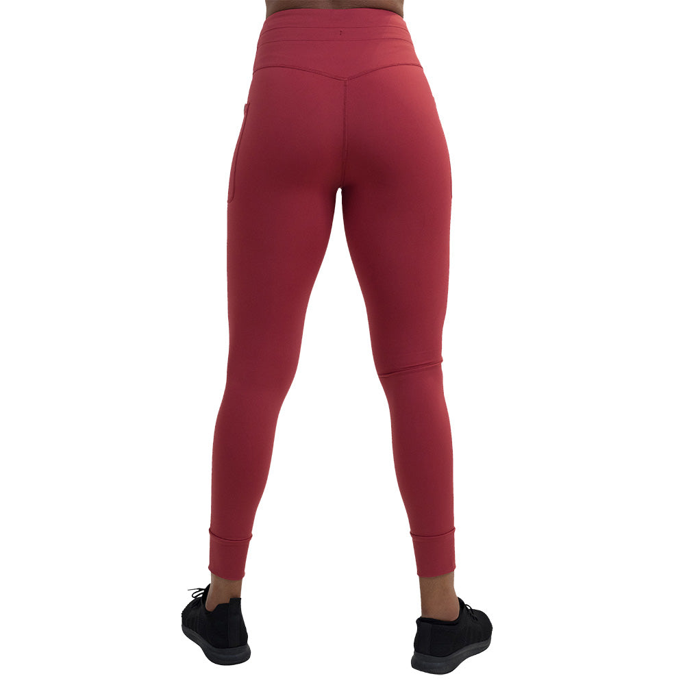 back of the omni garnet red full length leggings against a white background
