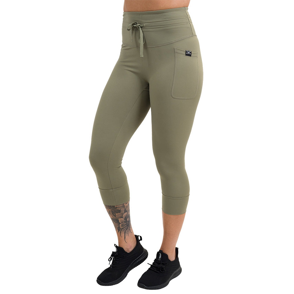omni green tea capri leggings facing the front against a white background