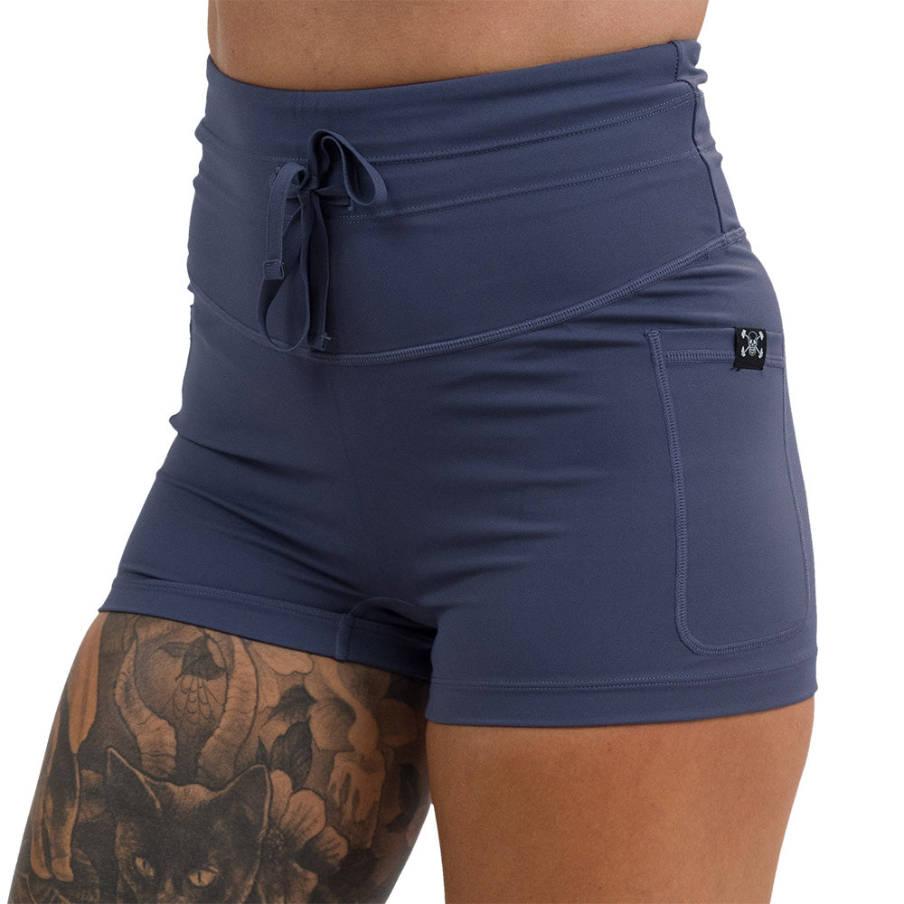 close up of the omni twilight purple 2.5 inch shorts
